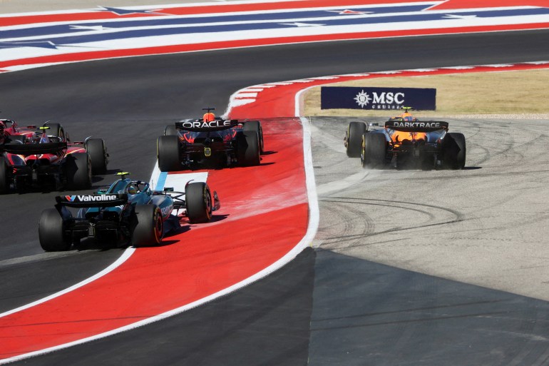 Formula One F1 - United States Grand Prix - Circuit of the Americas, Austin, Texas, United States - October 20, 2024 McLaren's Lando Norris and Red Bull's Max Verstappen in action during the race REUTERS/Kaylee Greenlee Beal