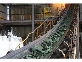 A conveyor belt moves raw cobalt for processing at the Etoile mine, operated by Chemaf Sarl, in Katanga province near Lubumbashi, the Democratic Republic of Congo, on Wednesday, Dec. 22, 2021. Along a 250-mile highway which cuts through central Africa, thousands of flatbed trucks haul sheets of copper and sacks of cobalt hydroxide, essential for electric cars and other 21st century technologies for which drivers must pay steep tolls, as much as $900 for a round trip. Photographer: Lucien Kahozi/Bloomberg