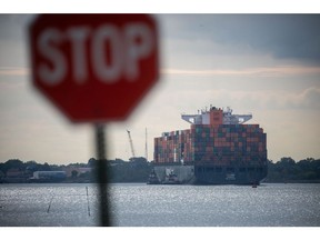 A container ship leaves the Port of Newark in Elizabeth, New Jersey, on Sept. 30.