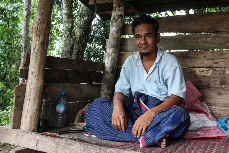 Mohammed Yusuf lost his eyesight in a landmine explosion two decades ago but still leads a jungle outpost with young Muslim fighters [Lorcan Lovett/Al Jazeera]