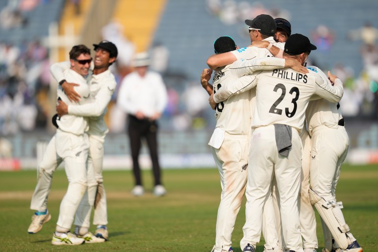 New Zealand' players celebrate after their win against India on the day three of the second cricket test match at the Maharashtra Cricket Association Stadium , in Pune, India, Saturday, Oct. 26, 2024. (AP Photo/Rafiq Maqbool)