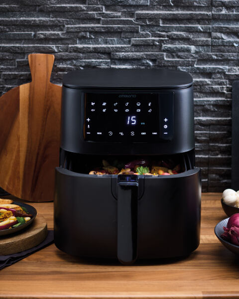 a black air fryer with the number 15 on it