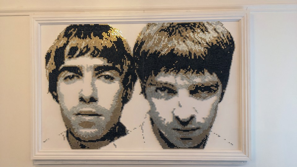 An artist has created this image of Oasis brothers Liam and Noel Gallagher using thousands of screws