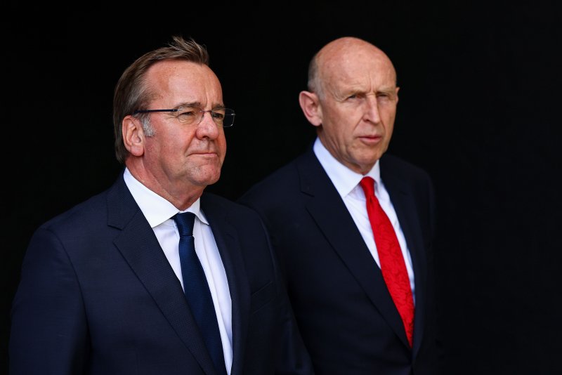 German Defense Minister Boris Pistorius (L) and the British Secretary of State for Defense John Healey walk to lay a British wreath of flowers for the German soldiers who died in the line of duty, in Berlin, Germany, on July 24, 2024. They are expected to sign a significant security pact in London on Wednesday that will see their two militaries work closer together. File Photo by Hannibal Hanschke/EPA-EFE