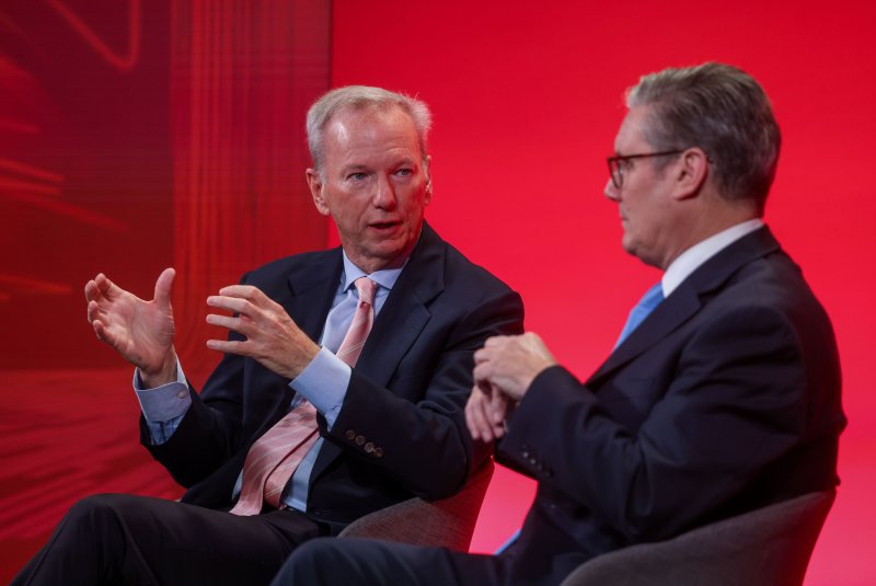 Former Google chairman and co-founder of Schmidt Futures Eric Schmidt (L) in an "in conversation" session with British Prime Minister Keir Starmer on Monday at his International Investment Summit at the Guildhall in London. Hollie Adams/EPA-EFE/Pool