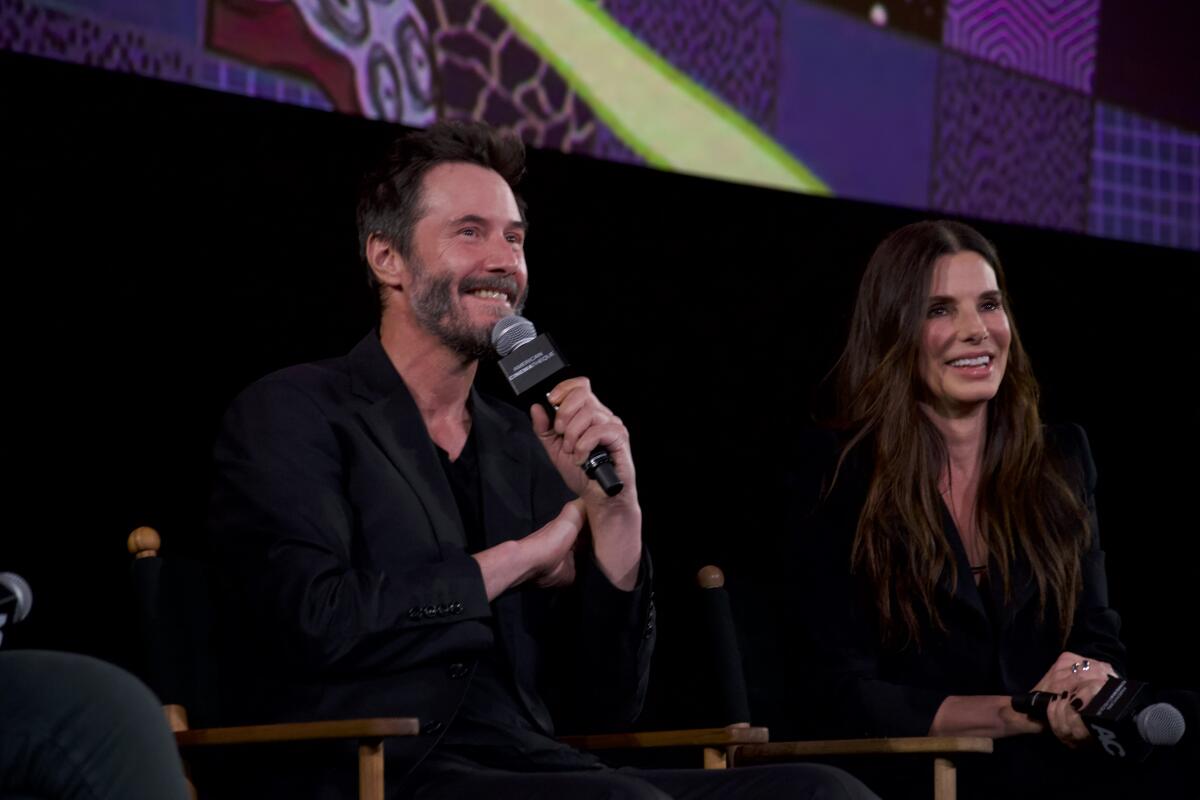 Two actors speak during a post-screening Q&A.