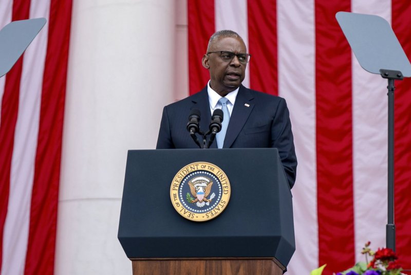 Defense Secretary Lloyd Austin speaks during the 156th National Memorial Day Observance Ceremony in the Memorial Amphitheater at Arlington National Cemetery in Arlington, Virginia on May 27. He visited Kyiv, Ukraine on Monday. File Photo by Bonnie Cash/UPI.