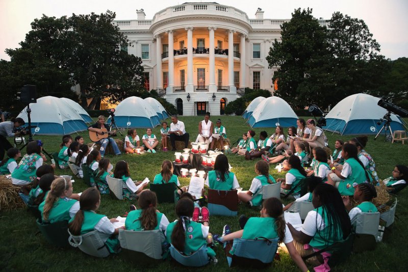 A group of Girl Scouts from across the country are shown holding a campout on the South Lawn of the White House hosted by then-President Barack Obama and first lady Michelle Obama on June 30, 2015. The organization's board is proposing a 240% hike in dues amid growing deficits and declining membership. File Pool Photo by Chip Somodevilla/UPI