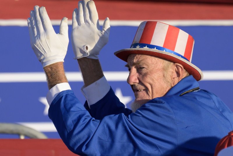 A supporter of former President Donald Trump dresses as Uncle Sam during the rally at the Butler Farm Show grounds in Pennsylvania on Saturday. Photo by Archie Carpenter/UPI.