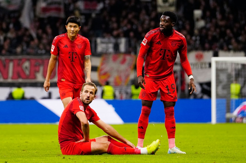 Kim Min-Jae and Alphonso Davies look on as Harry Kane went down for Bayern and was taken off in the 72nd minute of a 3-2 win at Eintracht