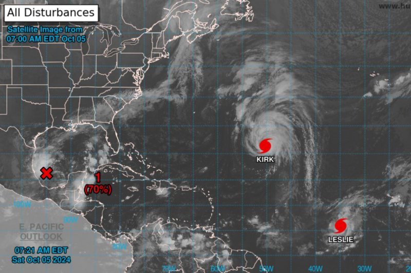 Two hurricanes are churning with no threat to land in the Atlantic Ocean: Kirk, a Category 3 storm, and Leslie, which became a hurricane late Friday. Satellite image courtesy National Oceanic and Atmospheric Administration