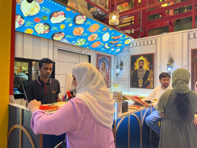 Tourists at an Indian restaurant at a Bangkok shopping mall