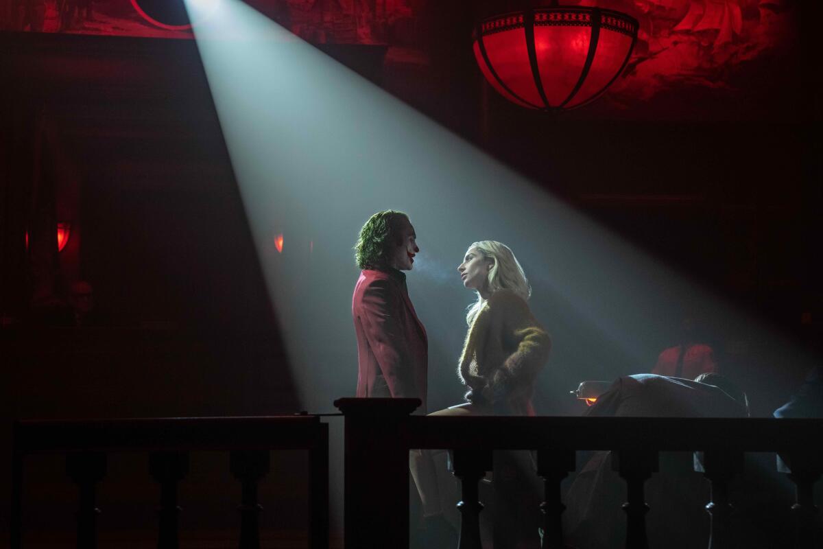 Joaquin Phoenix and Lady Gaga sing onstage in "Joker: Folie à Deux."