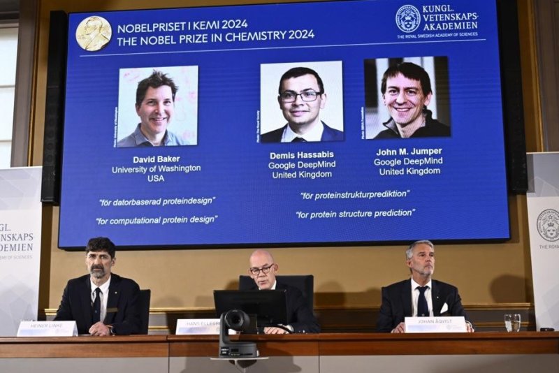 (L-R) Chairman of the Nobel Committee for Chemistry Heiner Linke, Secretary General of the Royal Swedish Academy of Sciences Hans Ellegren, and member of the Nobel Committee for Chemistry Johan Aqvist announce the winners of the 2024 Nobel Prize in Chemistry, at the Royal Swedish Academy in Stockholm, Sweden, on Wednesday, to David Baker, Demis Hassabis, John M Jumper. Photo by Christine Olsson/EPA-EFE