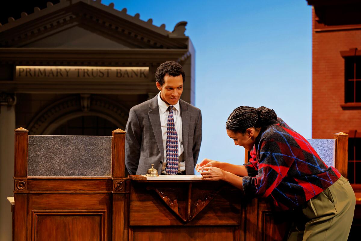 Caleb Eberhardt, left, and Rebecca S'manga Frank in La Jolla Playhouse's West Coast-premiere production of "Primary Trust."