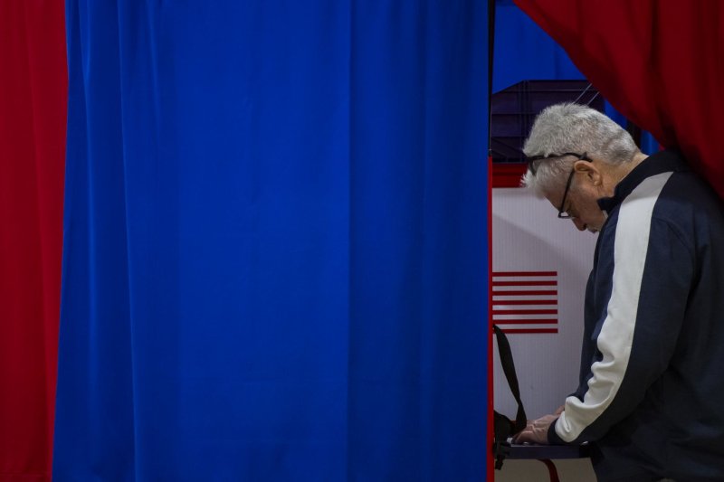 Voters cast their ballots in the New Hampshire Primary at a voting site at Pinkerton Academy in Derry, N.H., on Jan. 23. File Photo by Amanda Sabga/UPI