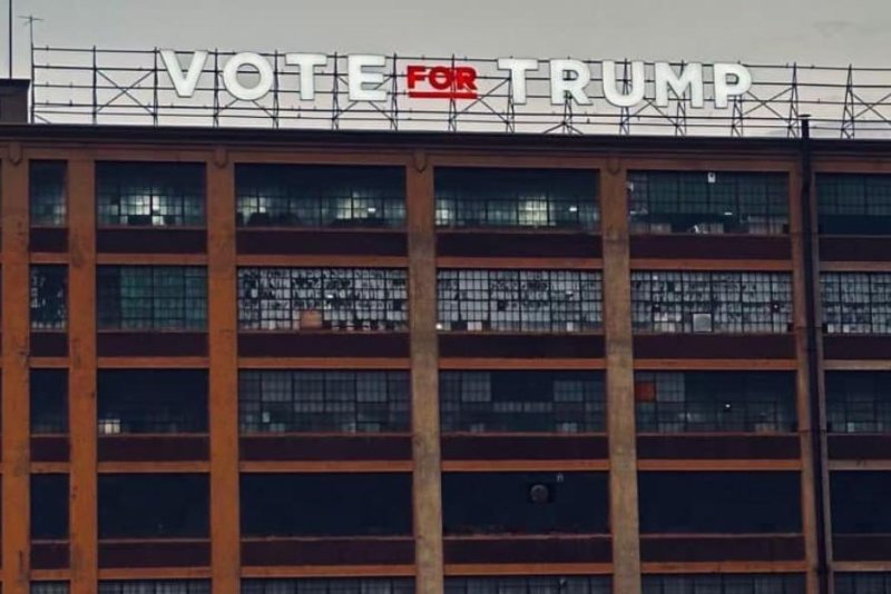 Sticker Mule has installed a 'Vote For Trump' sign on top of a building in Amsterdam, New York. It is now facing a lawsuit. Photo courtesy of court documents.