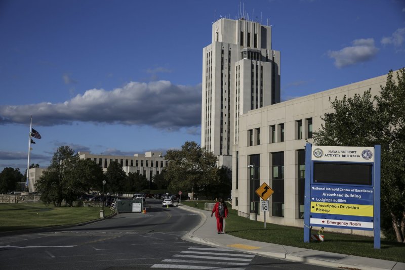 The exterior of the Walter Reed National Military Medical Center in Bethesda, Maryland, U.S., is seen on Friday, October 2, 2020. On Thursday, the Pentagon announced that two soldiers injured during an operation in Iraq were being transferred to the military hospital. File Photo by Oliver Contreras/UPI