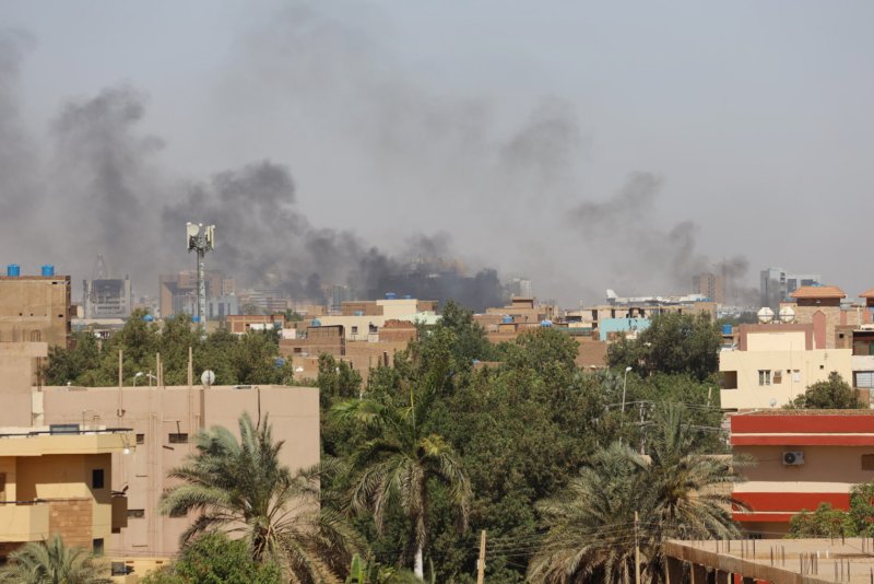 The U.S. Treasury Department Thursday announced sanctions on Sudanese Armed Forces weapon procurement director Mirghani Idris Suleiman. The SAF is supported by Iran and Russia. Treasury earlier this month sanctioned the other side, the Rapid Support Forces. Smoke rises over Khartoum, Sudan, during fighting between the SAF and RSF April 19 April, 2023. File photo by EPA-EFE/Stringer