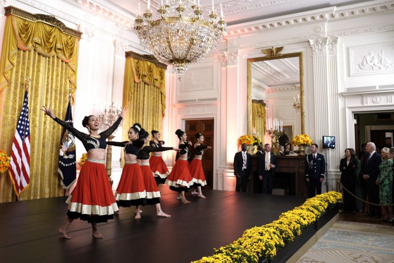 U.S. President Joe Biden, first lady Jill Biden and Vice President Kamala Harris watch a performance during a reception to celebrate Diwali in the East Room at the White House in Washington in 2022. Today, Biden will again headline a White House gathering to celebrate the traditional Indian holiday of Diwali. File Photo by Yuri Gripas/UPI