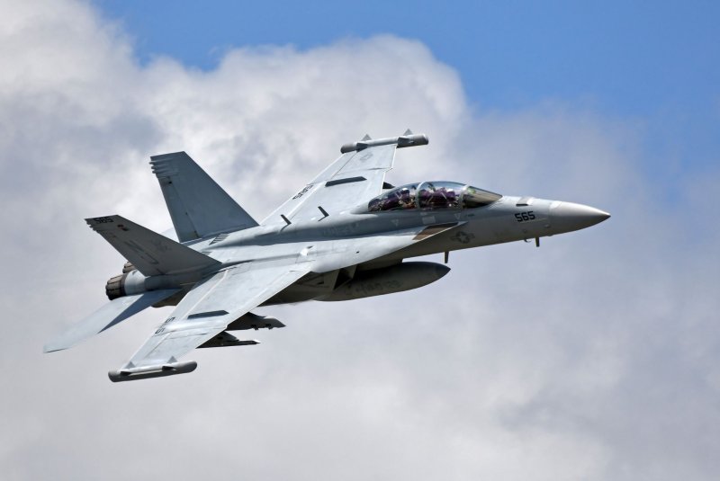 The U.S. Navy says it is unknown if two Navy pilots went down or ejected themselves from an EA-18G Growler fighter jet (as pictured) that crashed on a routine mission Tuesday. The wreckage of the jet was located Wednesday, but the pilots remain missing. File Photo by Joe Marino/UPI