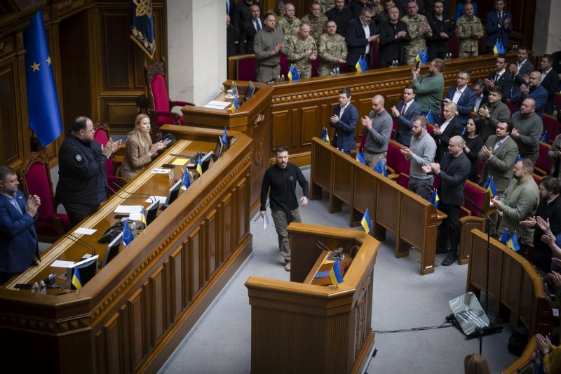 Ukrainian President Volodymyr Zelensky (C) receives a standing ovation from Ukrainian lawmakers Wednesday as he enters the Verkhovna Rada in Kyiv to present his "Victory Plan." Photo by EPA-EFE/Ukraine Presidential Press Service