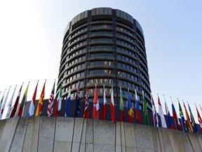 Flags of international countries outside the headquarters of the Bank for International Settlements in Basel, Switzerland.