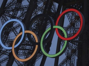 FILE - A general view of the Olympic rings displayed on the Eiffel Tower is pictured during the opening ceremony for the 2024 Summer Olympic Games.