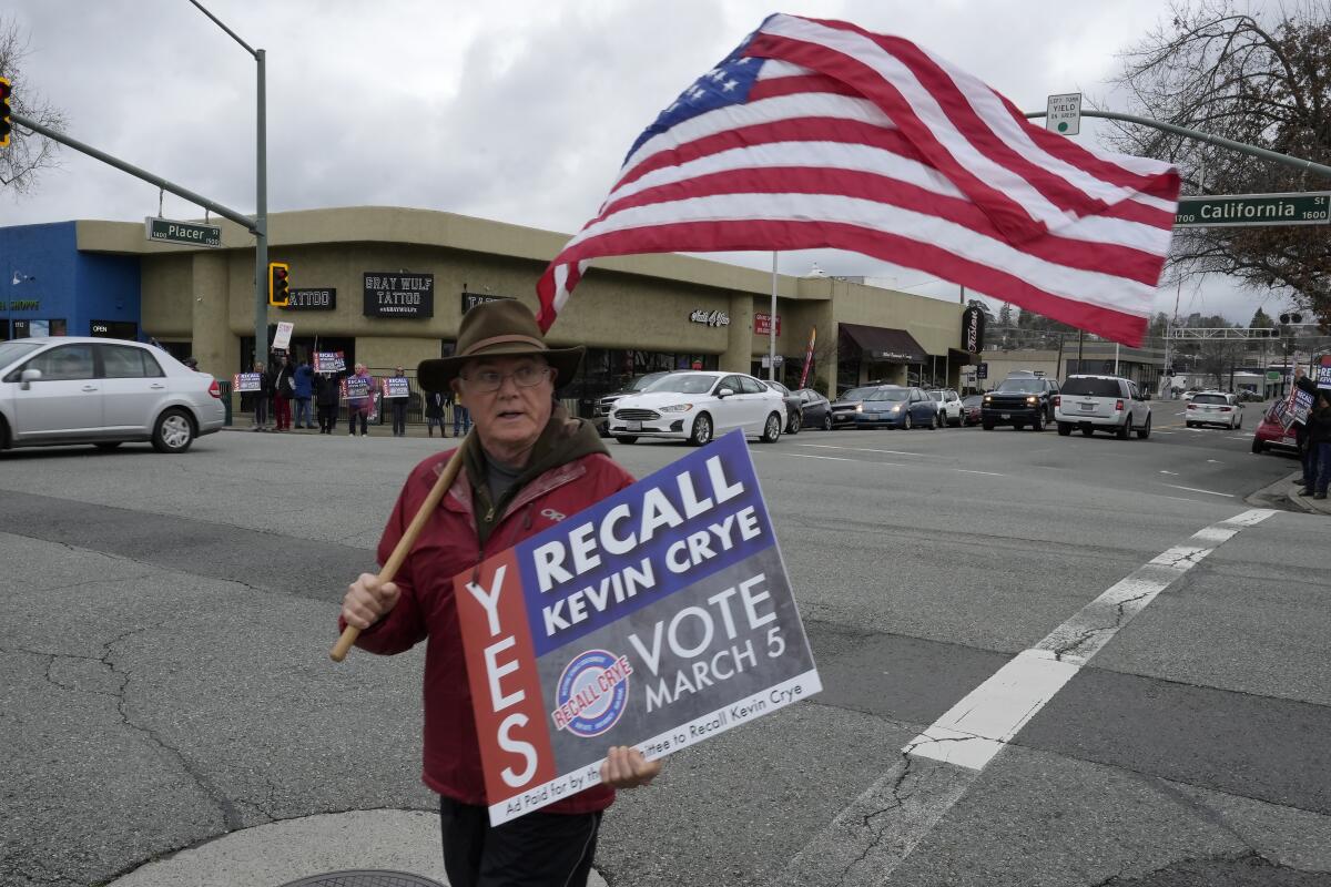 John Deaton joins others in a demonstration calling for the recall of Shasta County First District Supervisor Kevin Crye