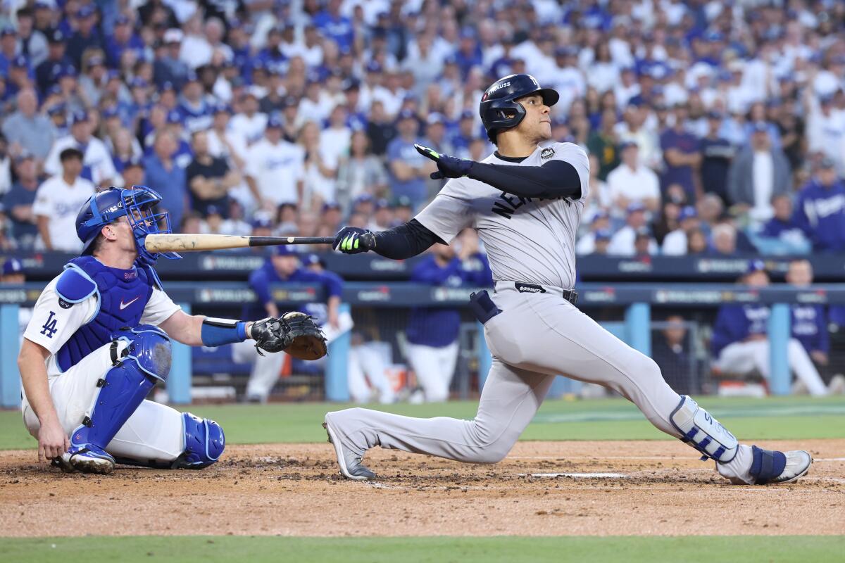 Yankees outfielder Juan Soto hits a home run in Game 2 of the World Series against the Dodgers at Dodger Stadium.