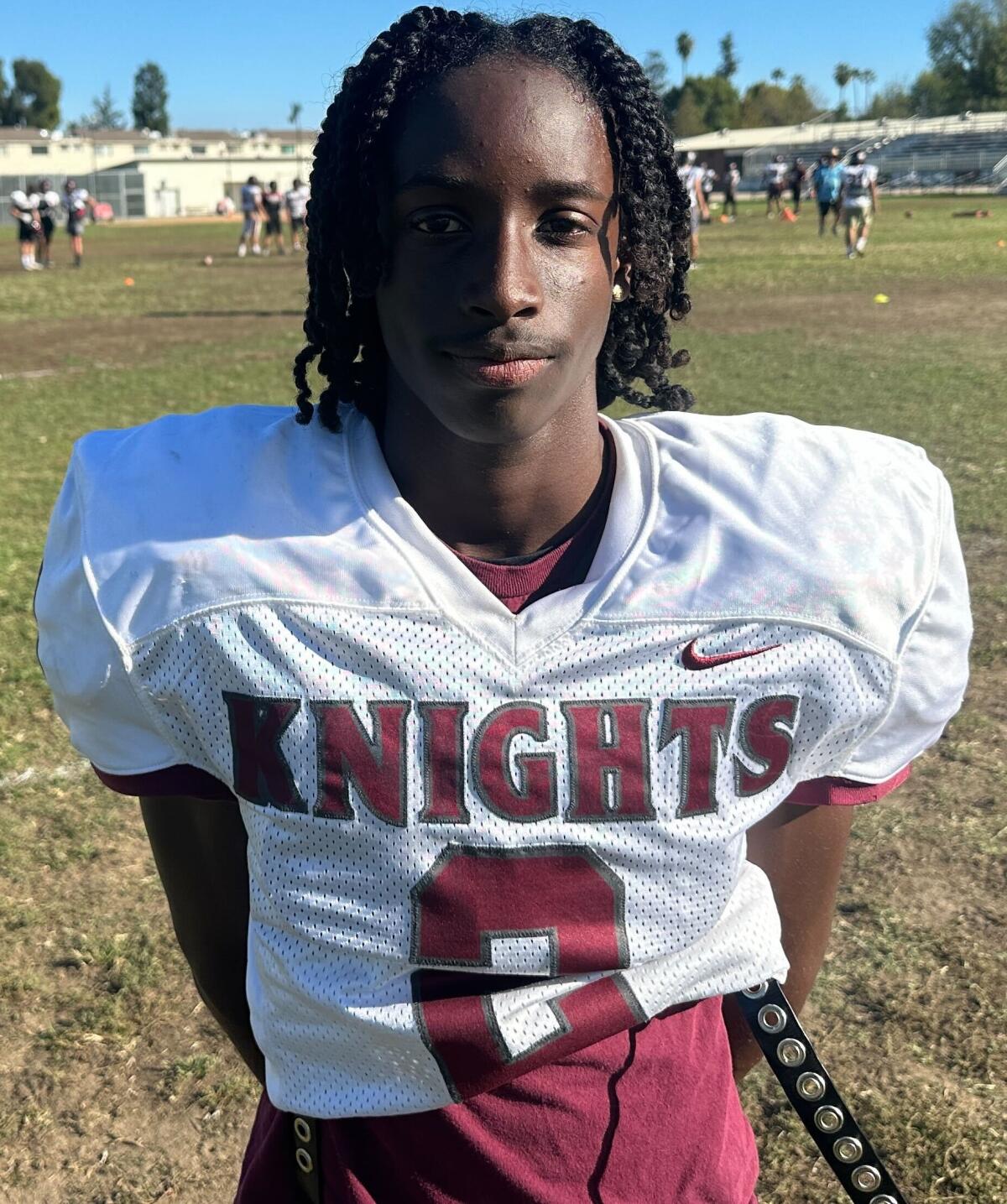 Sherman Oaks CES quarterback and safety King Burns poses for a photo at practice.