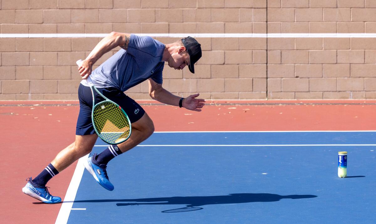 Karue Sell sprints while training on the courts at Redondo Union High School on Sept. 17, 2024 in Redondo Beach.