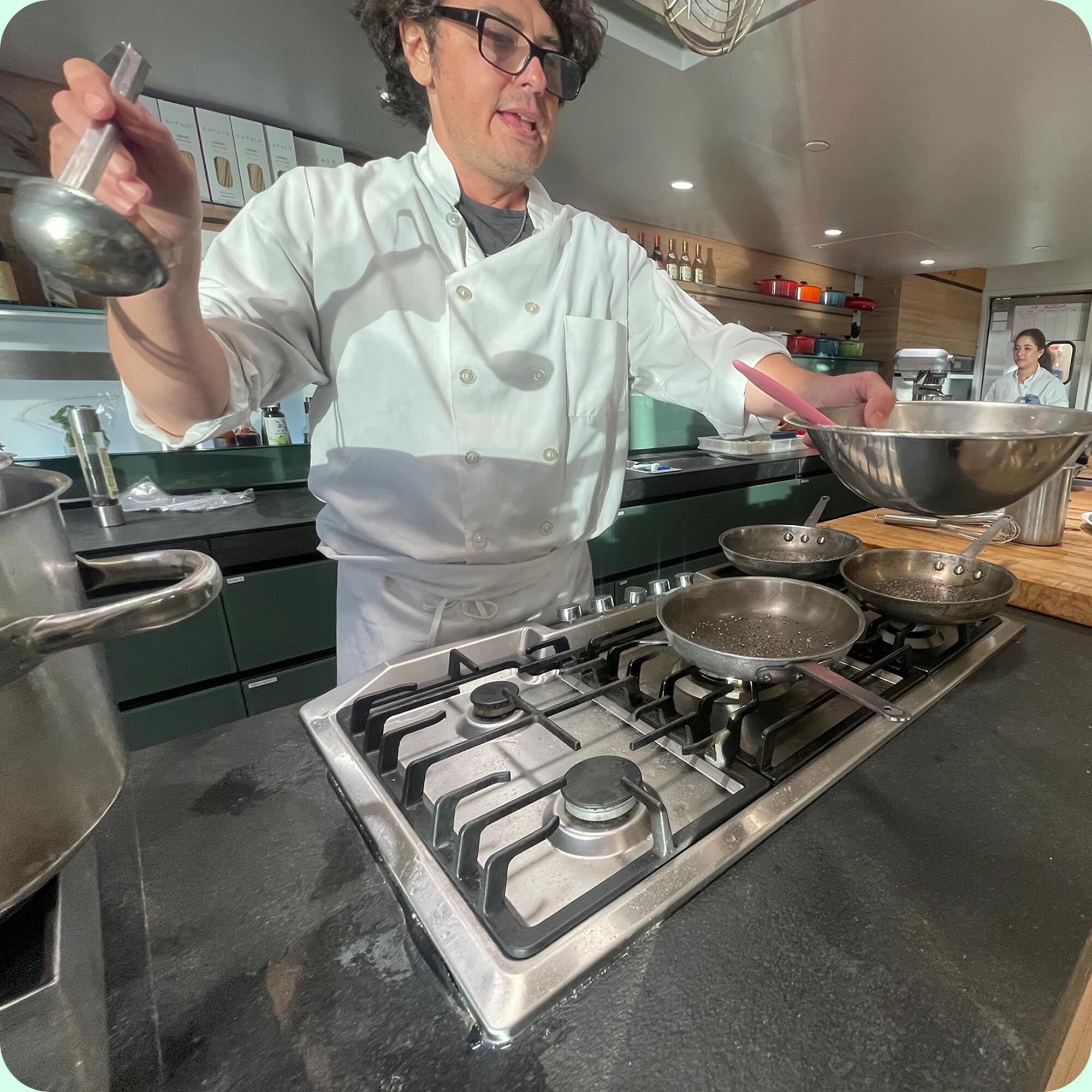 Fabio Angelini (a.k.a. Chef Bibo) demonstrates cooking at an Eataly Los Angeles cooking class