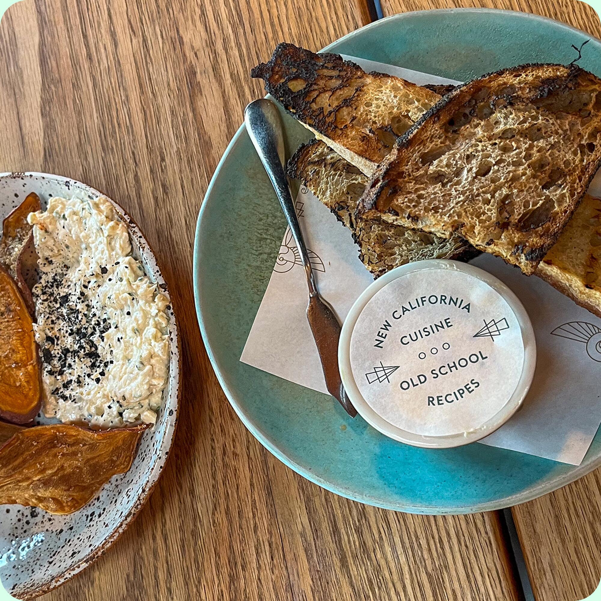 Various food items including bread at Lingua Franca.