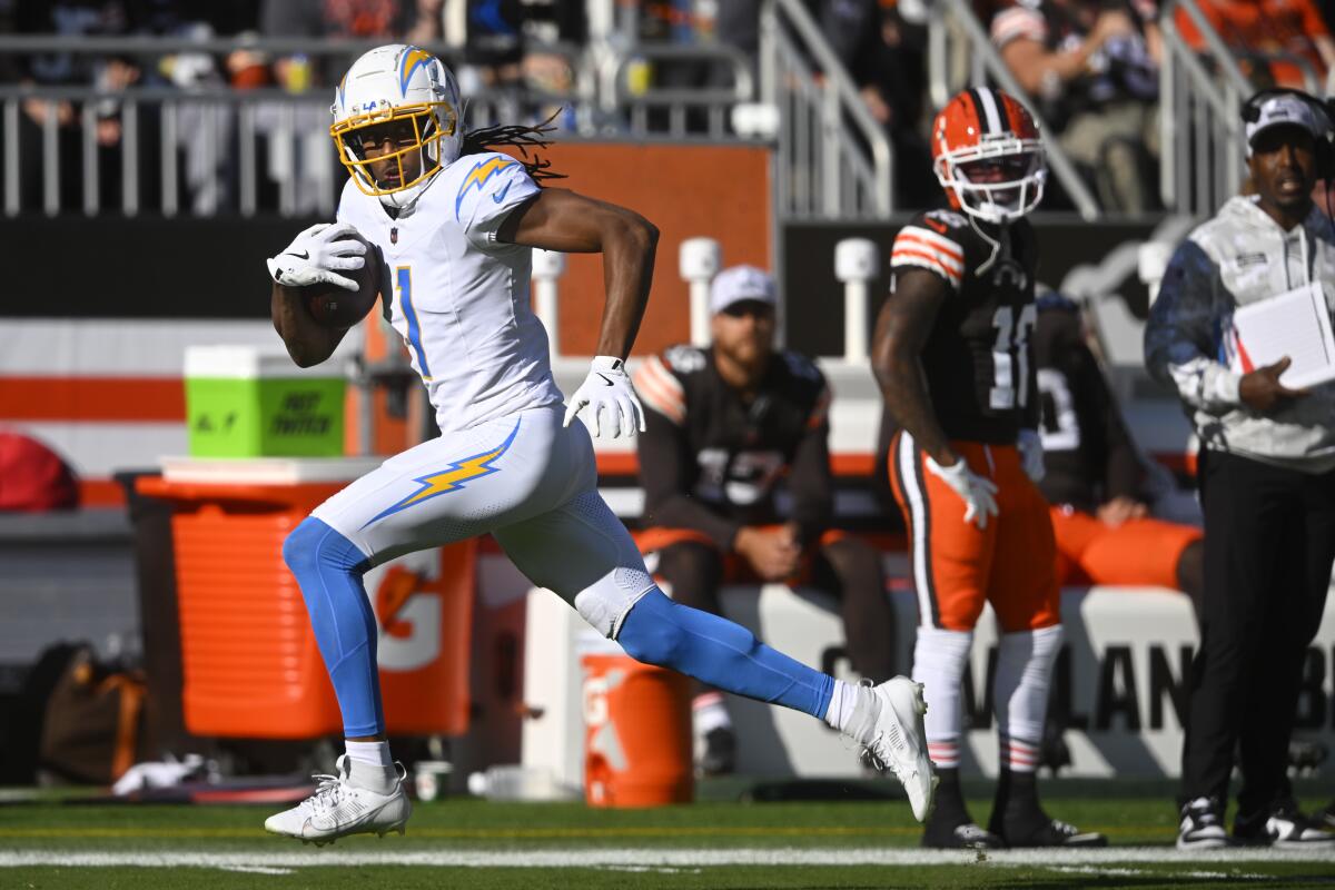 Chargers receiver Quentin Johnston (1) scores a touchdown on a 66-yard pass reception against the Cleveland Browns.