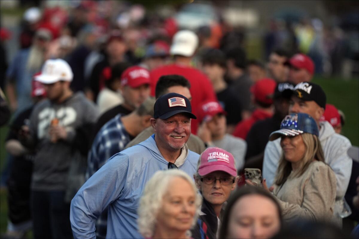 Supporters arrive before former President Trump speaks at a campaign rally in Gastonia, N.C., on Saturday.