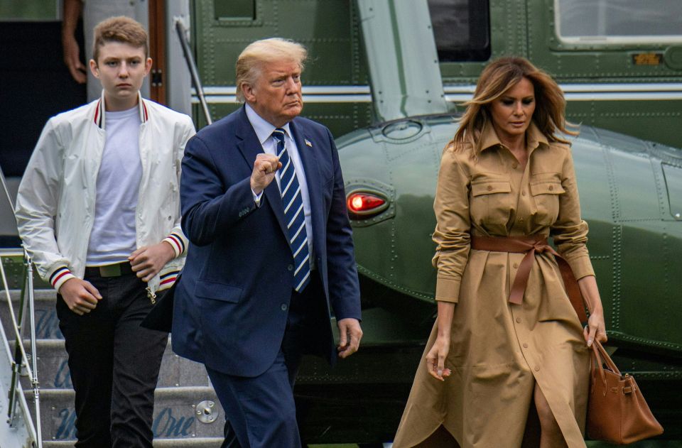 Barron Trump (left) Donald Trump, and Melania Trump in Washington, DC, on August 2020