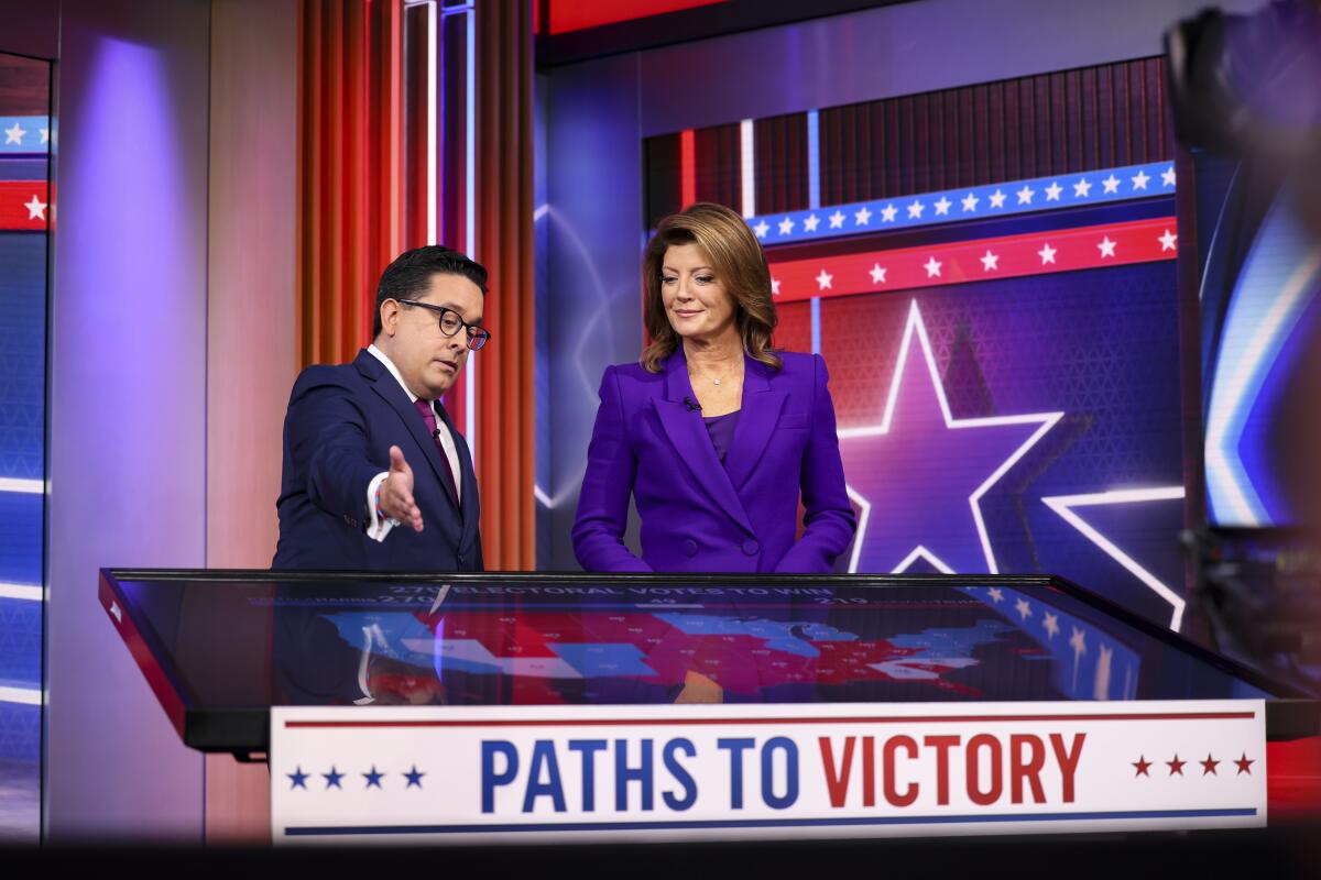 Ed O'Keefe and Norah O'Donnell from CBS News’ election coverage.