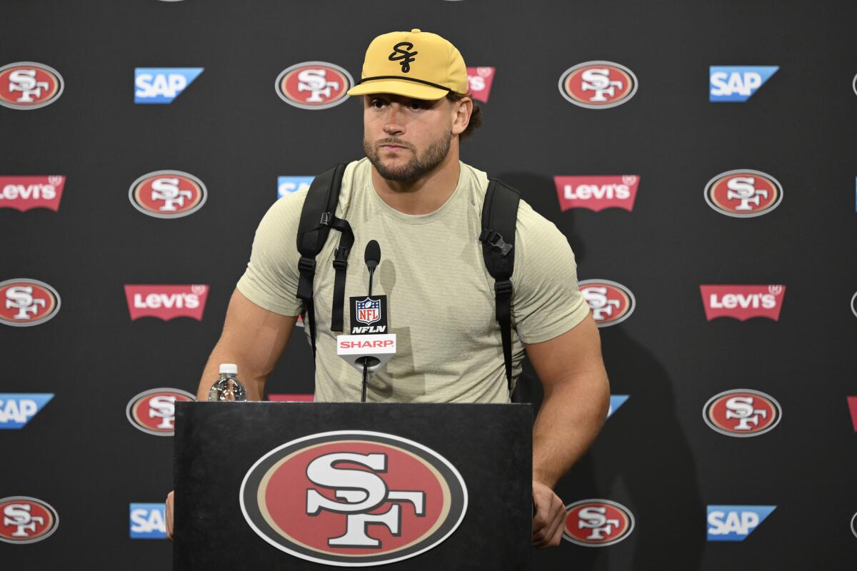 49ers defensive end Nick Bosa speaks to reporters during a news conference