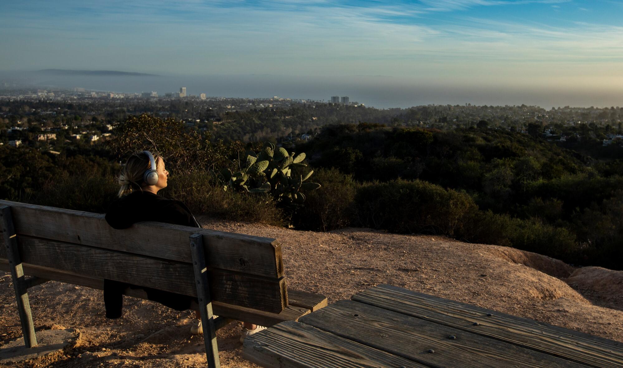 A hiker at Inspiration Point in Will Rogers State Historic Park in Pacific Palisades.