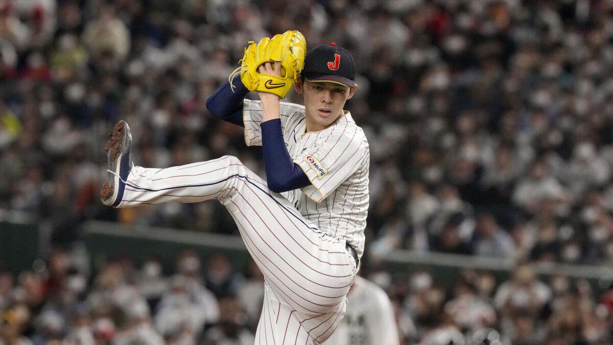 Roki Sasaki pitches for Japan in the World Baseball Classic in March 2023.