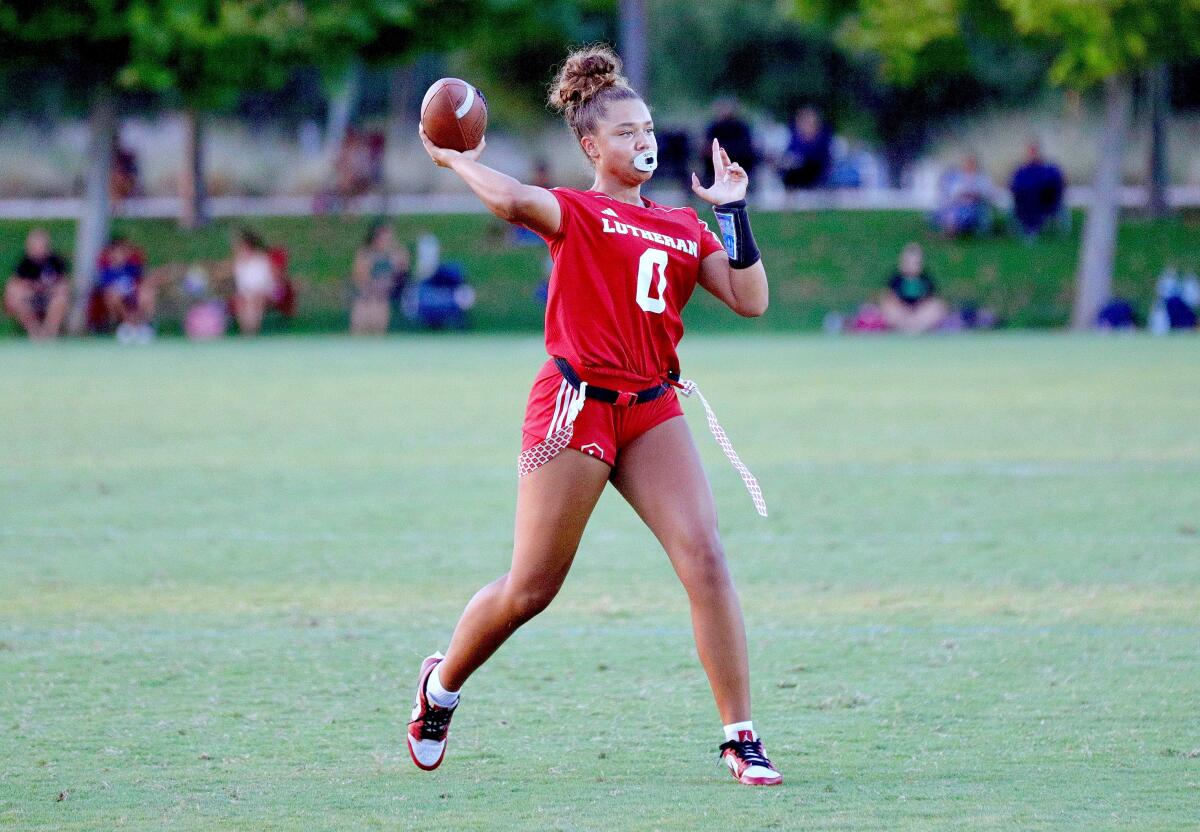 Orange Lutheran quarterback Makena Cook throws a pass.