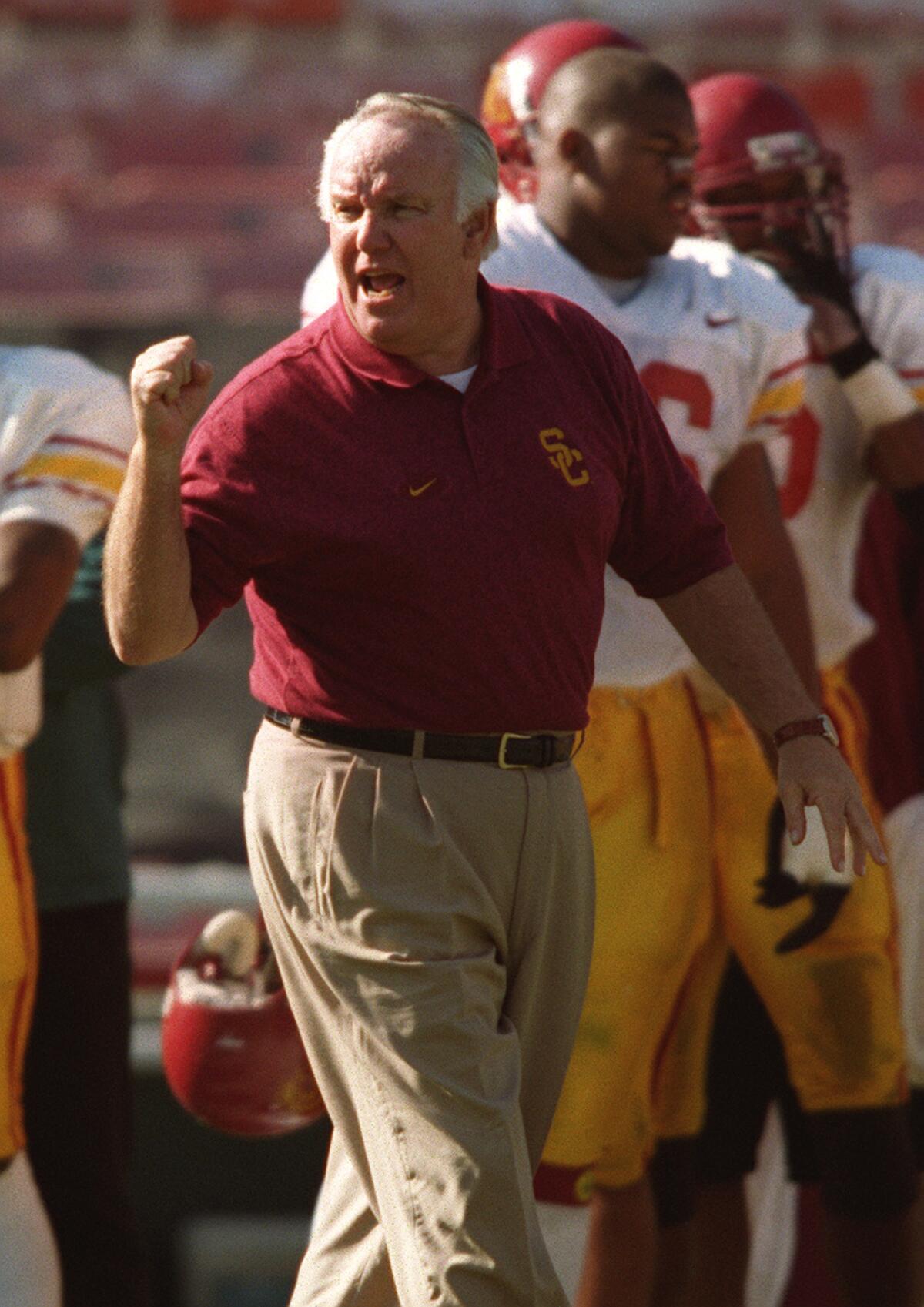 USC coach John Robinson reacts on the sideline during a game against UCLA in 1996.