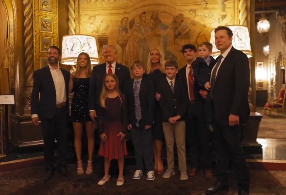 Elon Musk (far right) featured in the Trump family photo on election night