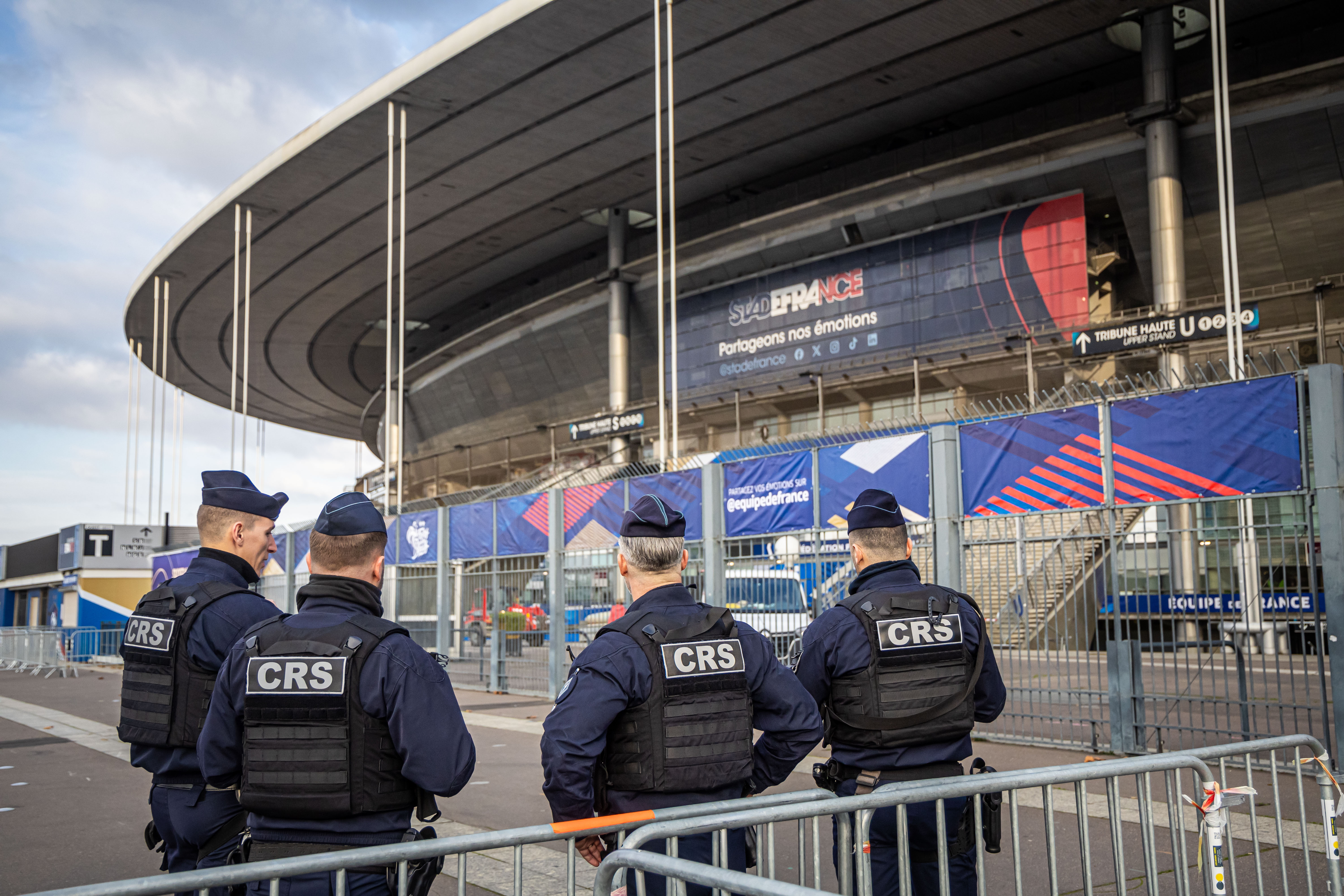 French police stand outside the Stade de France stadium prior to Israel's behind closed doors training session