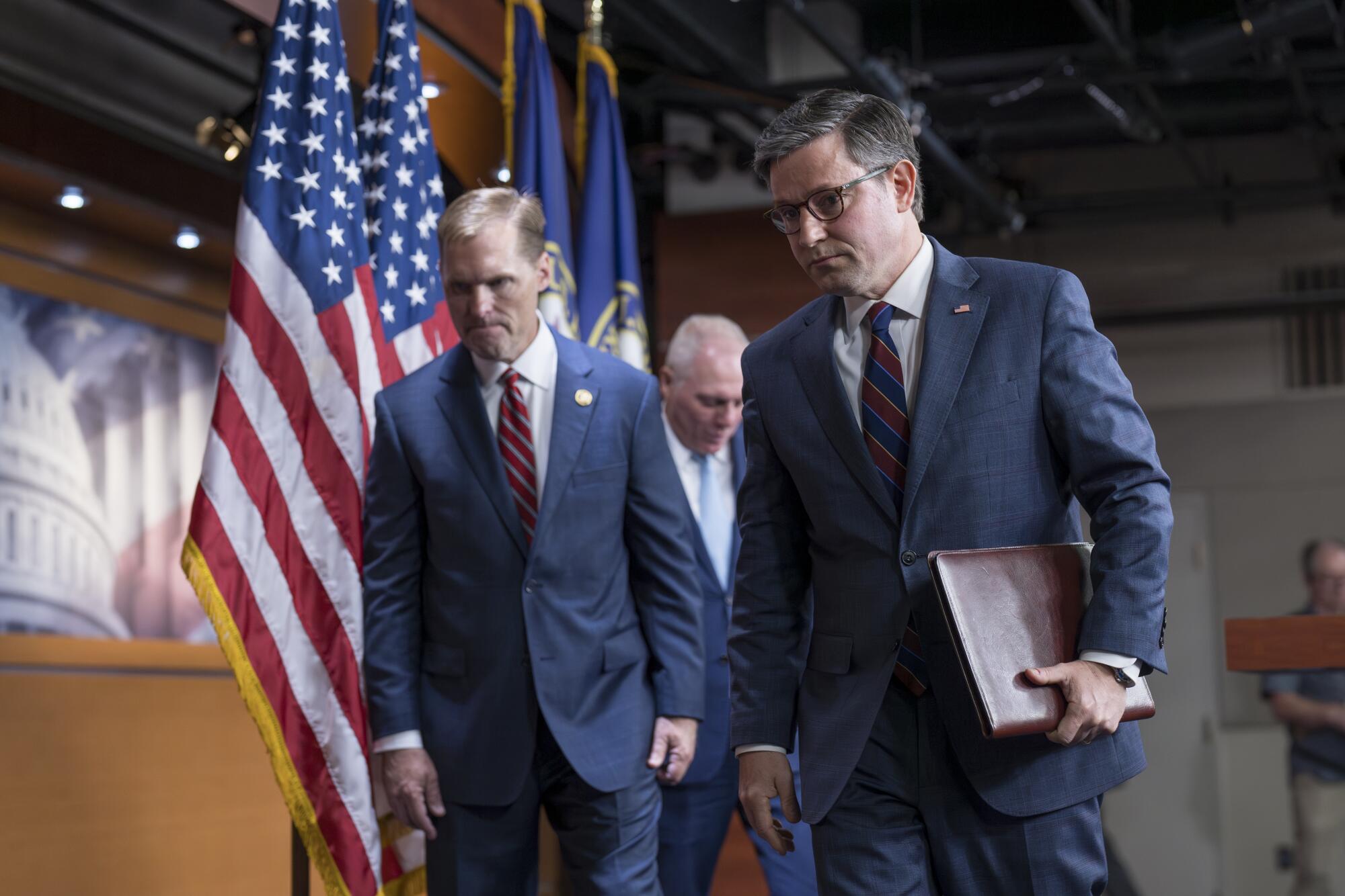 House Speaker Mike Johnson (R-La.), Rep. Michael Guest. (R-Miss.), left, and House Majority Leader Steve Scalise (R-La.).