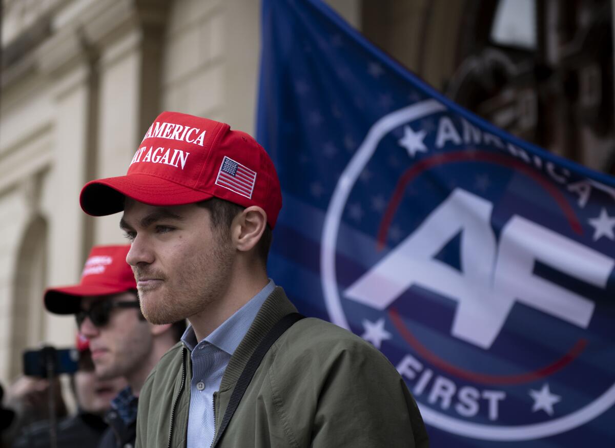 Nick Fuentes, a far-right activist, holds a rally at the Michigan state Capitol, in Lansing, Mich., in 2020.