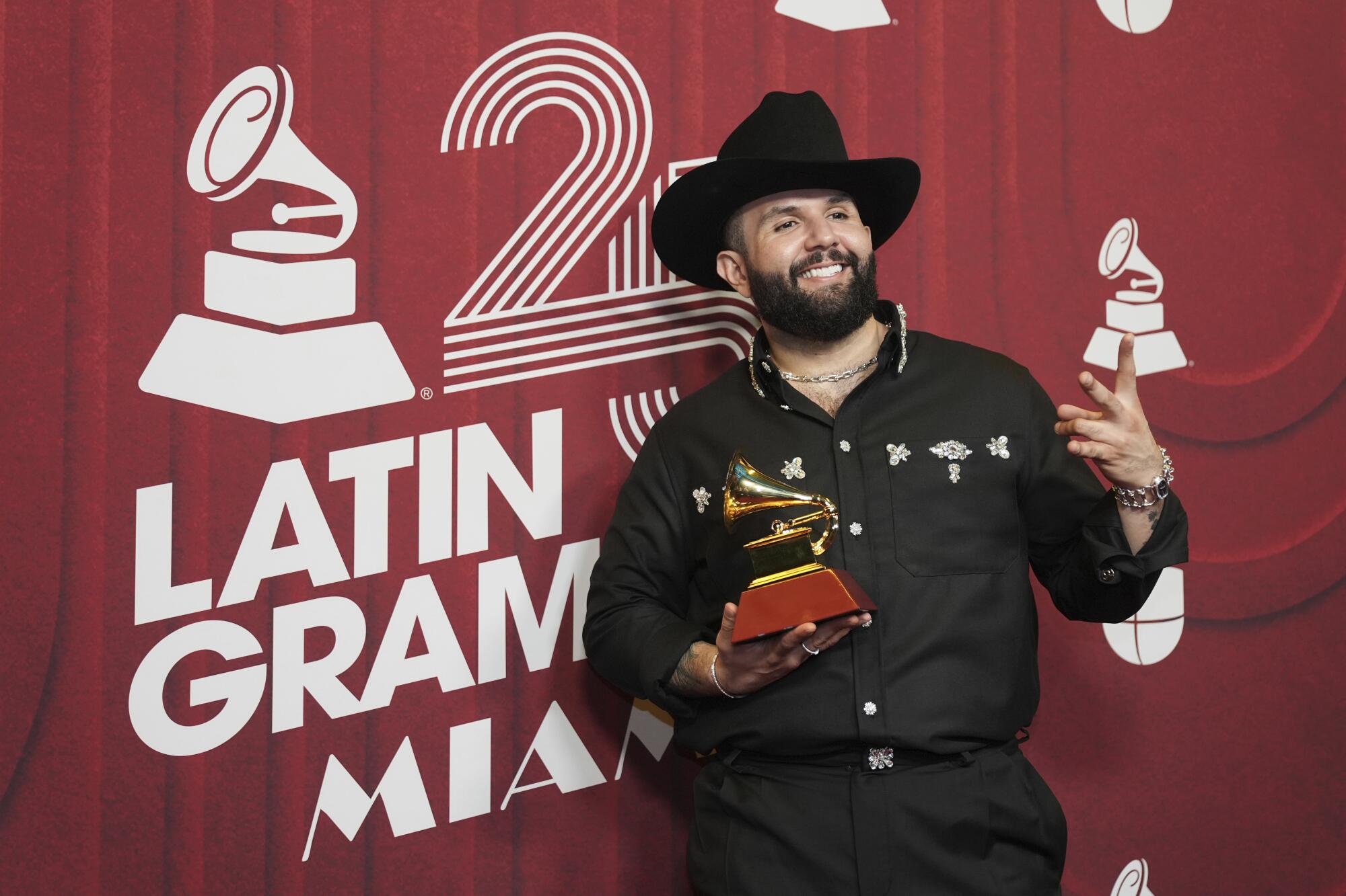 Carin Leon poses after winning an award for best contemporary Mexican music album at the 25th Latin Grammy Awards