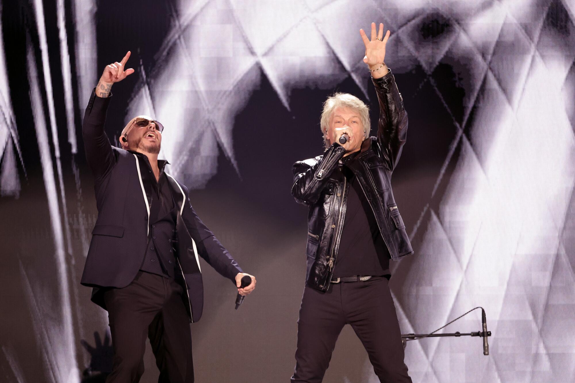 Pitbull and Jon Bon Jovi perform 