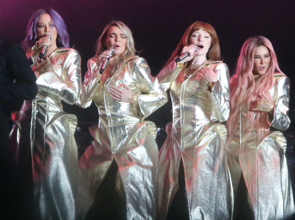 Girls Aloud have released a brand new version of I'll Stand By You, 20 years after it was first released